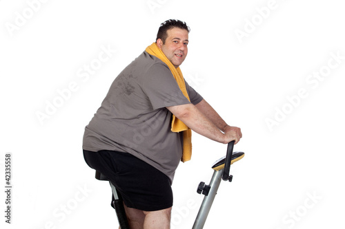 Photo: Fat man playing sport Fat man playing sport
