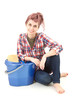 young woman with blue bucket , full length