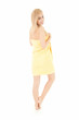 happy young woman in yellow towel, full length