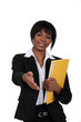 black businesswoman holding filer