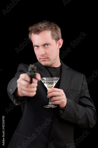 Photo: Male caucasian model with a gun Male caucasian model with a gun