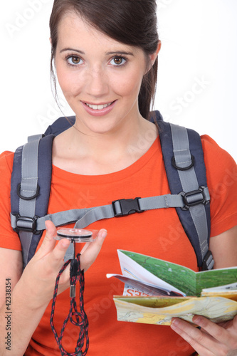 Photo: Explorer looking at her compass Explorer looking at her compass