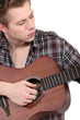 Man playing the guitar
