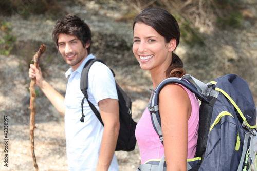 Photo: couple on a mountain hike couple on a mountain hike