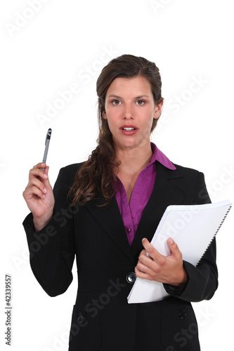 Photo: Woman with questionnaire Woman with questionnaire