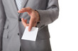 Confident businessman handing out card