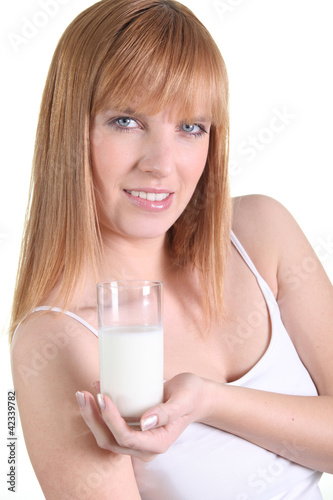Foto: Redhead with a glass of milk Redhead with a glass of milk