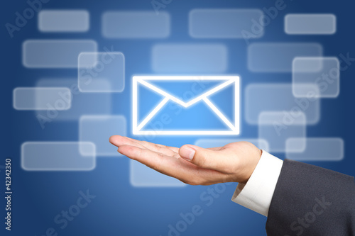 Photo: Screen Button air mail Interface on Business hand Screen Button air mail Interface on Business hand