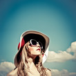 portrait of a beautiful girl in the sky