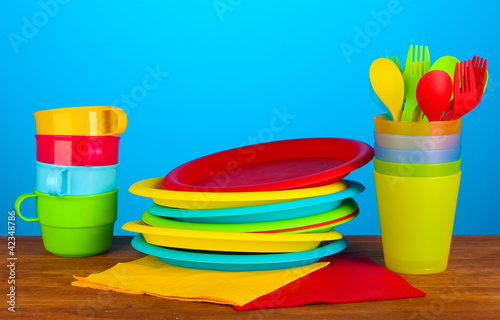 Photo: bright plastic disposable tableware bright plastic disposable tableware