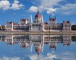 Budapest - Hungarian parliament.with reflection in Danube river Budapest - Hungarian parliament.with reflection in Danube river