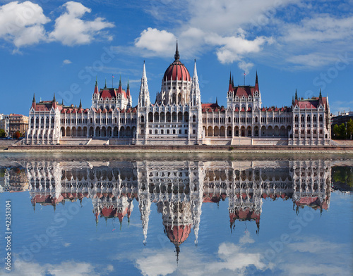 Photo: Budapest - Hungarian parliament.with reflection in Danube river Budapest - Hungarian parliament.with reflection in Danube river