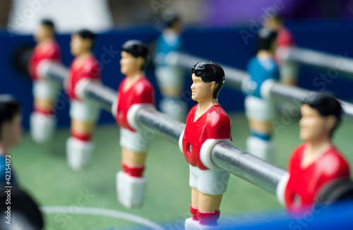Photo: Red table soccer players Red table soccer players