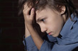 Caucasian child frustrated sitting