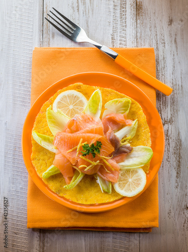 Foto: maize pancake with endive salad and smoked salmon maize pancake with endive salad and smoked salmon