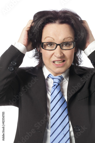 Photo: 40s businesswoman biting the bullet 40s businesswoman biting the bullet