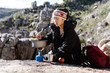 Cooking hiker woman