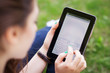 Woman using digital tablet
