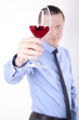 Photo: Young business man with a glass of wine Young business man with a glass of wine