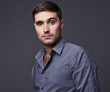 Foto: Elegant young handsome man. Elegant young handsome man.