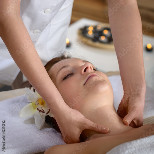 Photo: Woman neck massage at luxury spa Woman neck massage at luxury spa