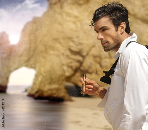 Photo: Formal man on beach Formal man on beach
