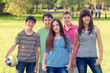 Happy teenage friends spending time together