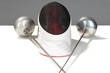 fencers sword and mask on a white background