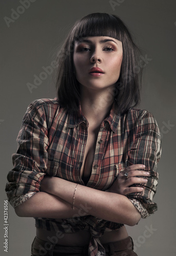 Photo: sexy woman in a hat in an image of the American cowboy sexy woman in a hat in an image of the American cowboy