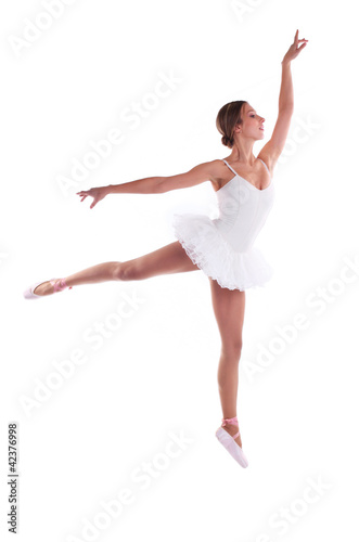 Photo: Young Caucasian ballerina jumping against white Young Caucasian ballerina jumping against white