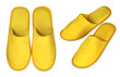 Pair of yellow house slippers isolated on white