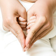 Photo: baby holding mother hand baby holding mother hand