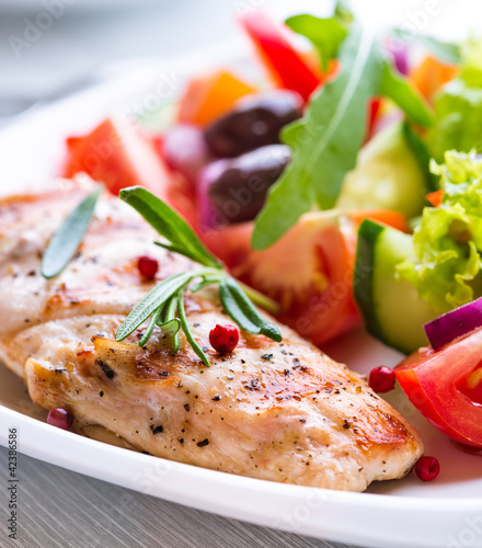 Photo: Grilled chicken fillet with vegtable salad Grilled chicken fillet with vegtable salad