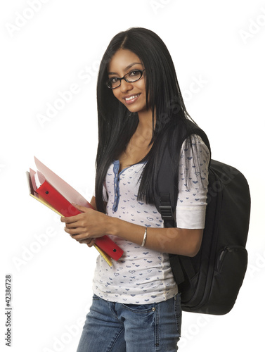 Photo: Pretty smilinf female student going to school Pretty smilinf female student going to school
