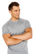 Handsome man with arms crossed looking his left on white