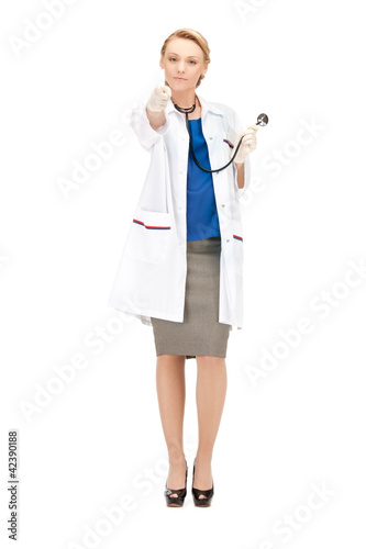 Photo: attractive female doctor pointing her finger attractive female doctor pointing her finger