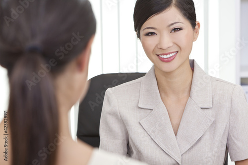 Photo: Asian Chinese Woman or Businesswoman in Office Meeting Asian Chinese Woman or Businesswoman in Office Meeting