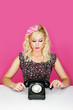 Foto: Woman with old telephone Woman with old telephone