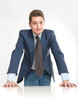 Foto: Businessman leaning on a desk Businessman leaning on a desk