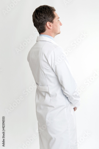 Photo: Profile of a man on lab coat Profile of a man on lab coat