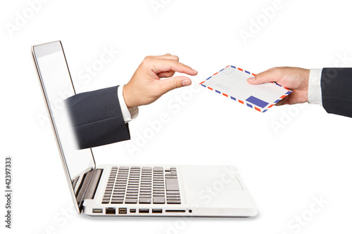 Photo: A business people hand holding air mail with hand concept of re A business people hand holding air mail with hand concept of re