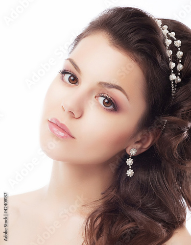Photo: Beautiful bride face closeup - isolated on white background Beautiful bride face closeup - isolated on white background