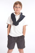 Schoolboy with hands in pockets