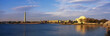 Photo: This is the Jefferson Memorial and Washington Monument in the spring. Cherry blossoms are blooming on the trees. There is a blue sky with white clouds and the setting is all next to the Tidal Basin. This is the Jefferson Memorial and Washington Monument in the spring. Cherry blossoms are blooming on the trees. There is a blue sky with white clouds and the setting is all next to the Tidal Basin.