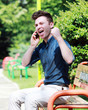 Photo: Happy young man on telephone Happy young man on telephone