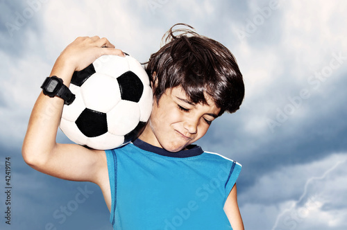Photo: Football player celebrating victory Football player celebrating victory