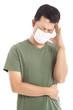 man wearing a face mask with headache