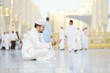 Muslim prayer at holy mosque