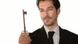 businessman showing the key to success