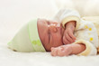 Photo: Closeup portrait of a one week old baby boy asleep Closeup portrait of a one week old baby boy asleep